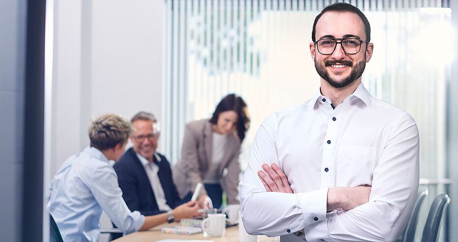 ibo Berater beim Meeting mit Kunden zu Organisationsthemen und Business-Analysen