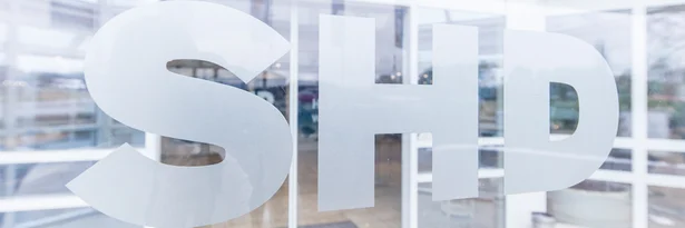 SHD Logo auf Glas-Eingangstür